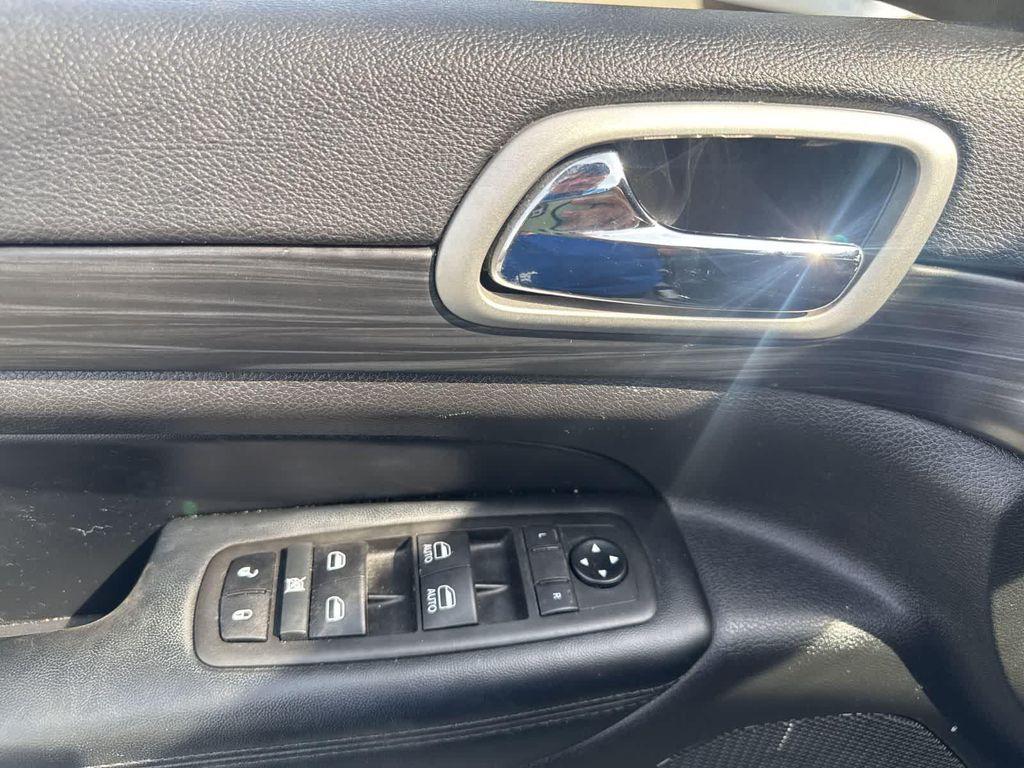 used 2021 Jeep Grand Cherokee car, priced at $16,295