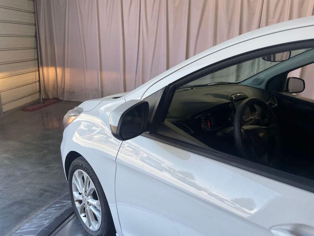 used 2021 Chevrolet Spark car, priced at $9,799