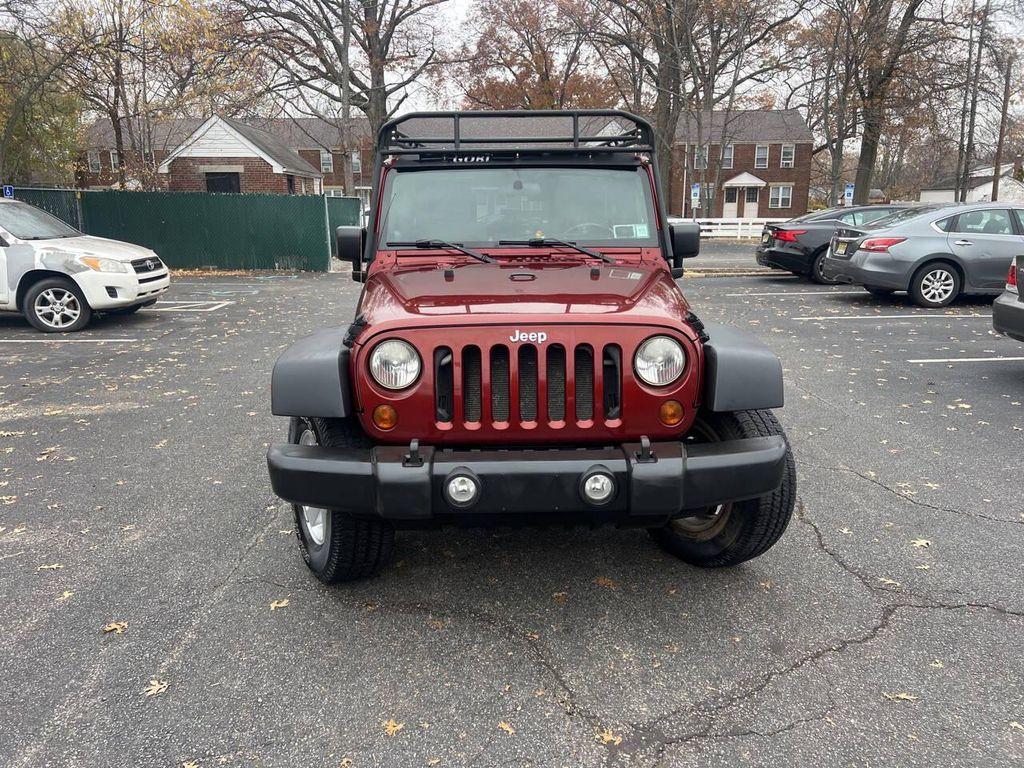 used 2010 Jeep Wrangler Unlimited car, priced at $11,995