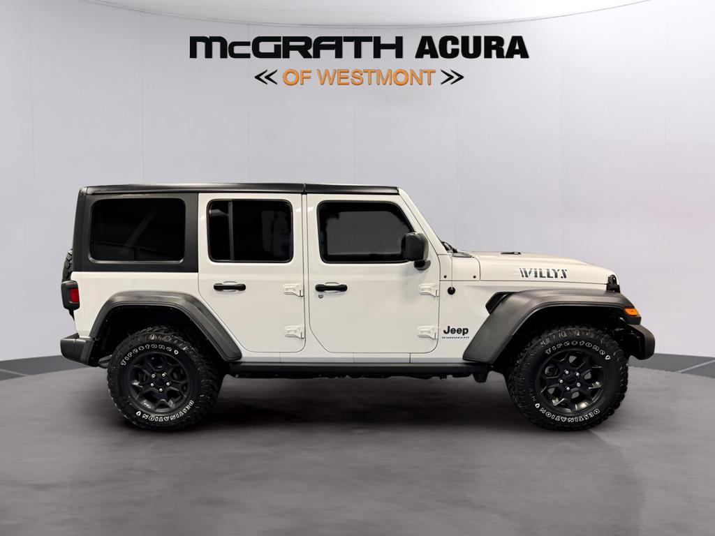 used 2023 Jeep Wrangler 4xe car, priced at $32,435