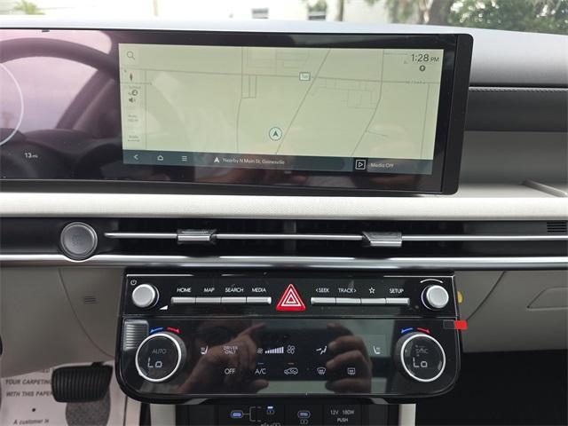 new 2025 Hyundai TUCSON Hybrid car, priced at $31,997