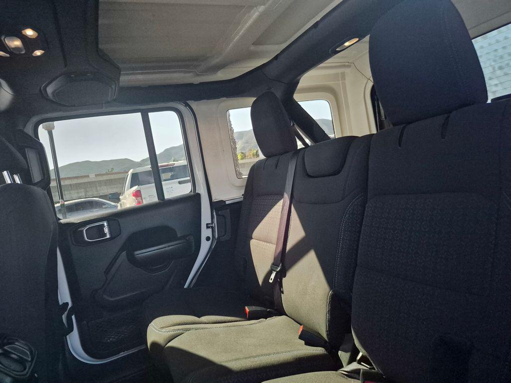 used 2021 Jeep Wrangler Unlimited car, priced at $24,494