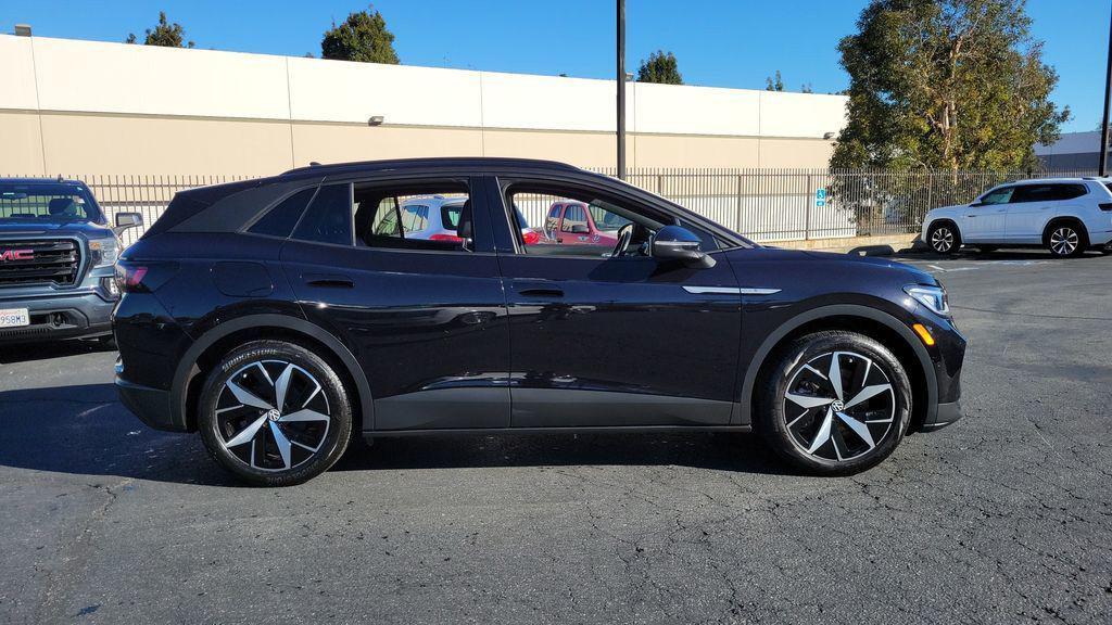 used 2023 Volkswagen ID.4 car, priced at $19,998