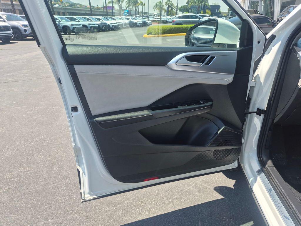 used 2025 Volkswagen Taos car, priced at $23,529