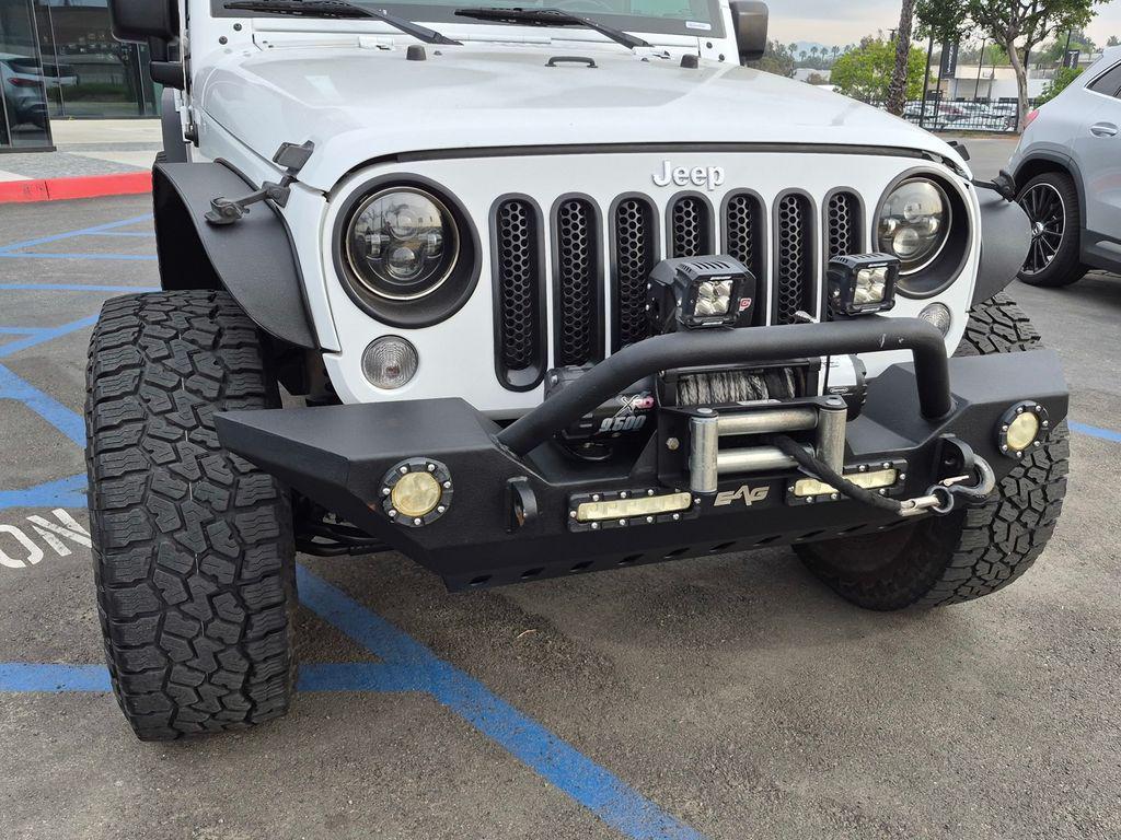 used 2017 Jeep Wrangler Unlimited car, priced at $19,015