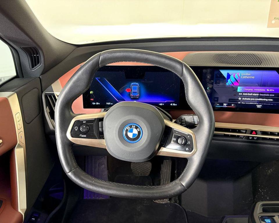 used 2023 BMW iX car, priced at $49,600