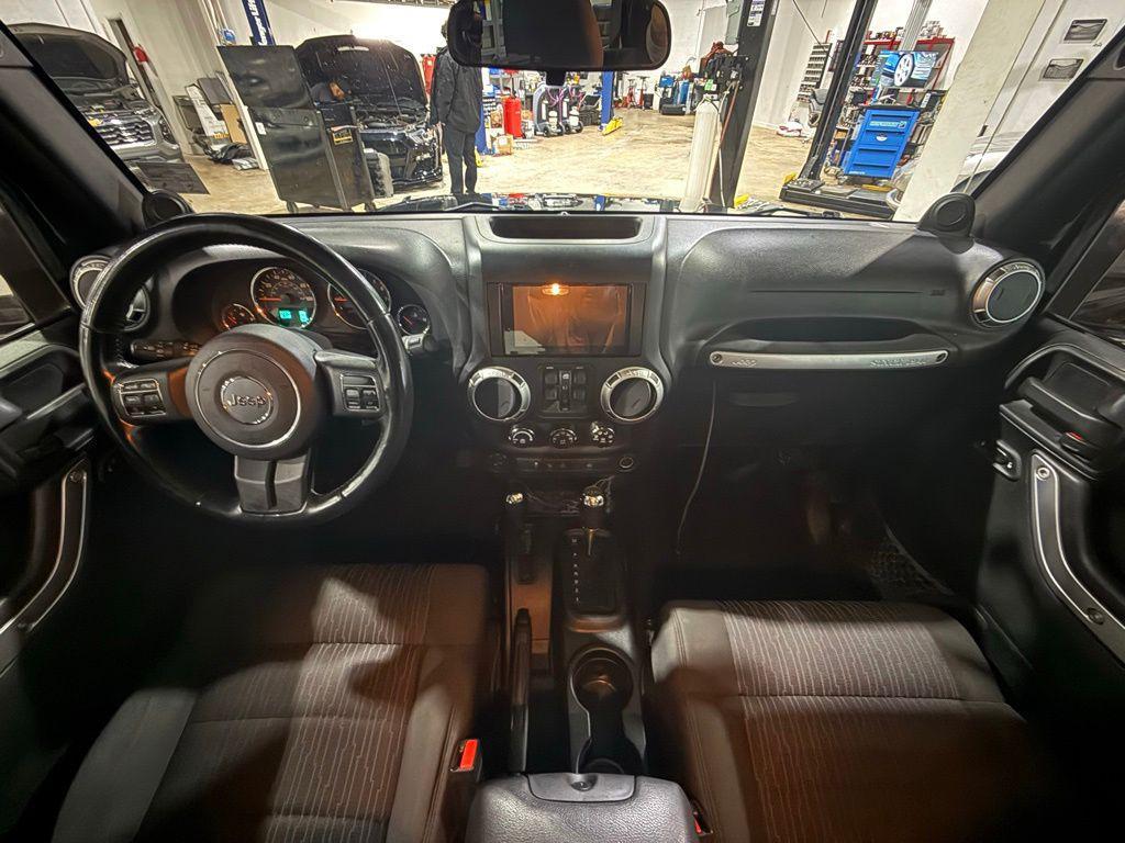 used 2011 Jeep Wrangler Unlimited car, priced at $12,495