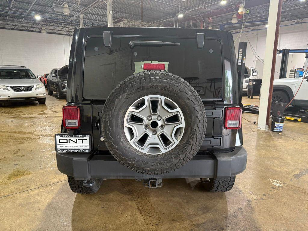 used 2013 Jeep Wrangler Unlimited car, priced at $15,295