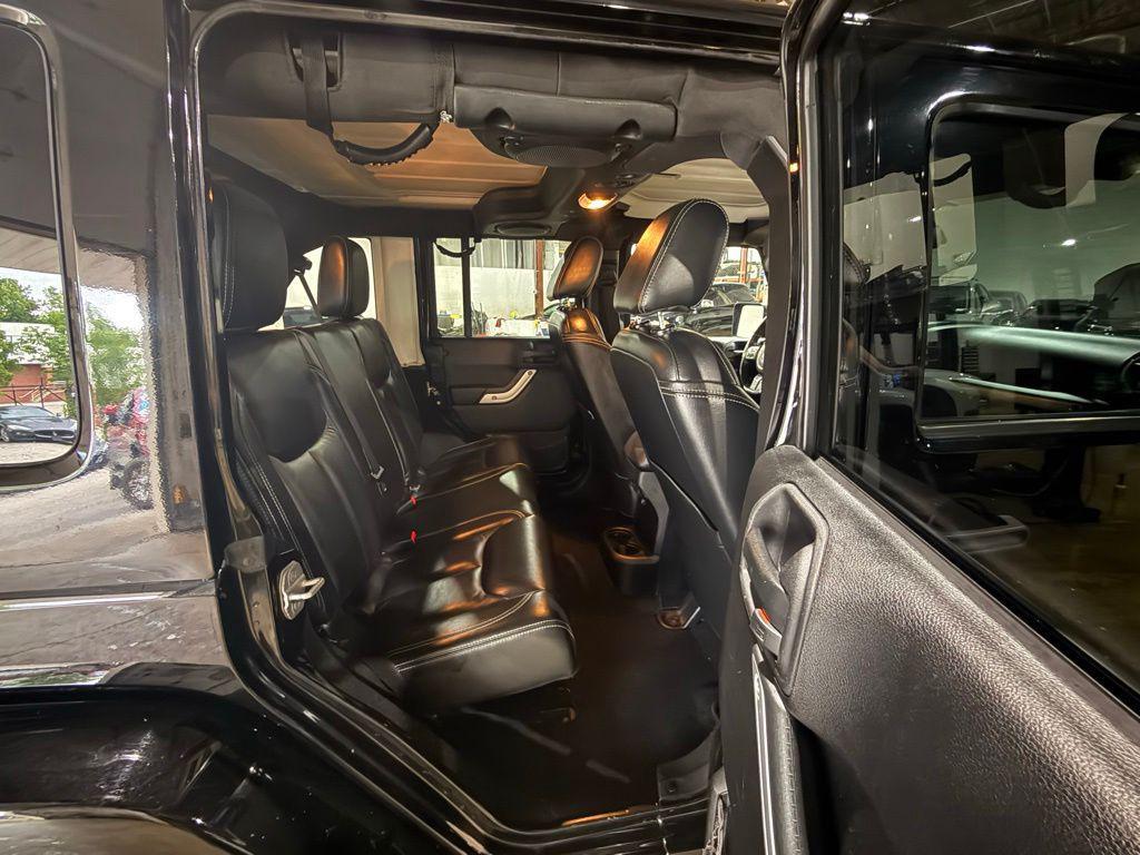used 2013 Jeep Wrangler Unlimited car, priced at $15,295