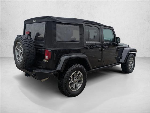 used 2014 Jeep Wrangler Unlimited car, priced at $21,198