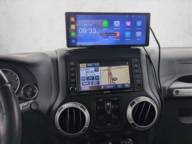 used 2014 Jeep Wrangler Unlimited car, priced at $21,198