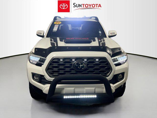 used 2021 Toyota Tacoma car, priced at $26,579