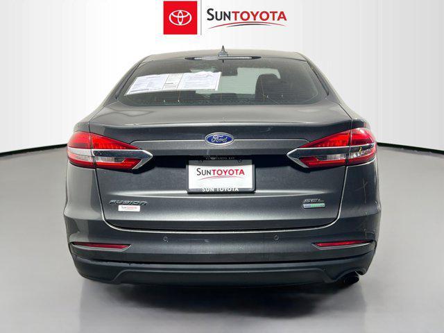 used 2020 Ford Fusion car, priced at $10,290