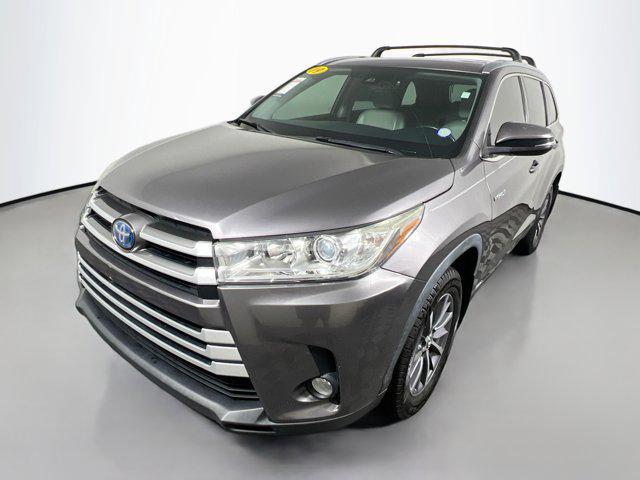 used 2019 Toyota Highlander Hybrid car, priced at $24,975
