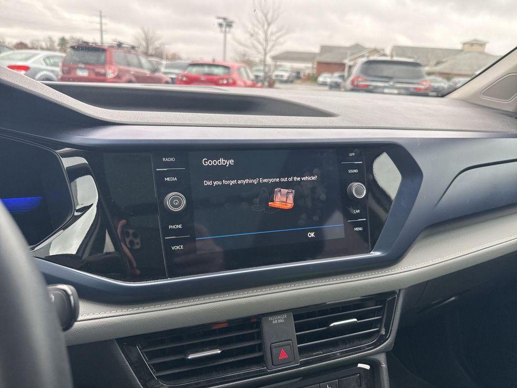 used 2023 Volkswagen Taos car, priced at $16,299