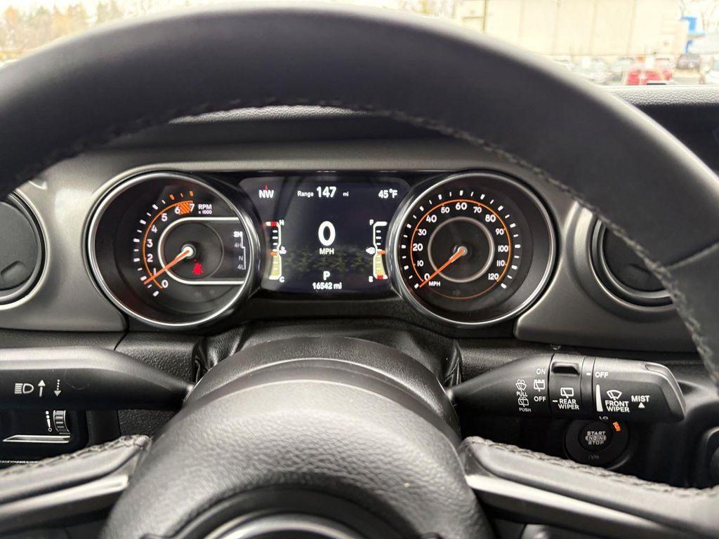 used 2023 Jeep Wrangler car, priced at $28,299