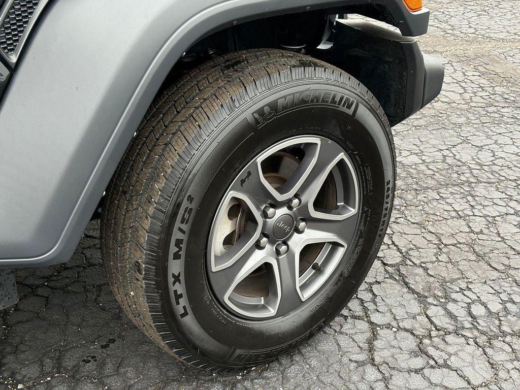 used 2023 Jeep Wrangler car, priced at $28,299