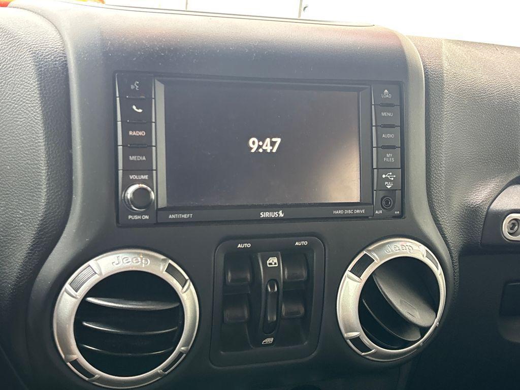 used 2016 Jeep Wrangler Unlimited car, priced at $18,153