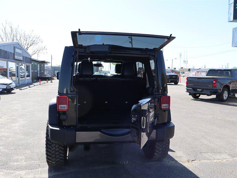 used 2013 Jeep Wrangler Unlimited car, priced at $17,977