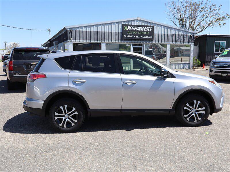 used 2018 Toyota RAV4 car, priced at $18,999