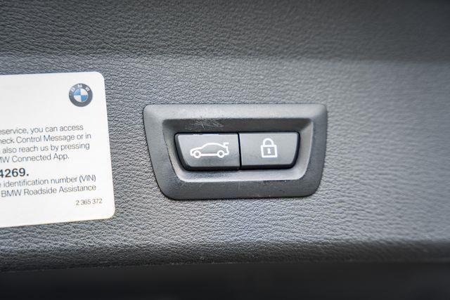 used 2018 BMW X1 car, priced at $14,000