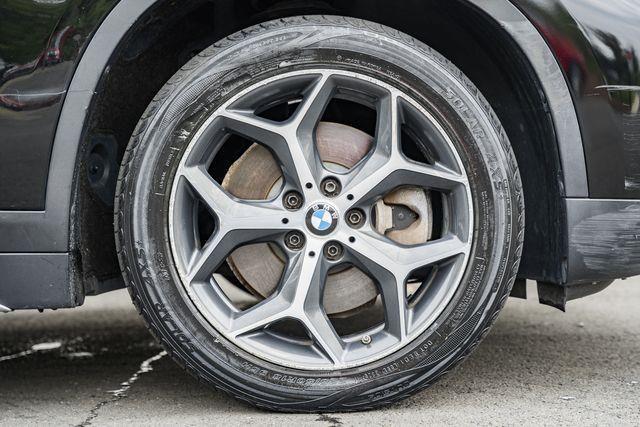 used 2018 BMW X1 car, priced at $14,000