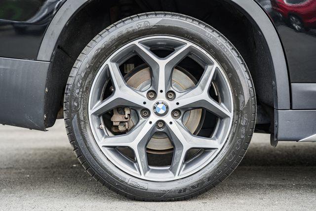 used 2018 BMW X1 car, priced at $14,000