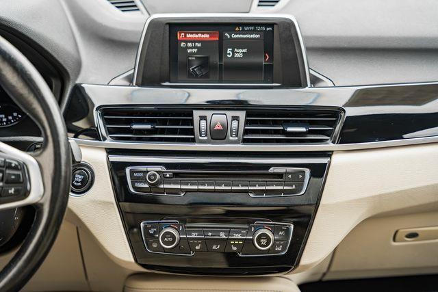 used 2018 BMW X1 car, priced at $14,000