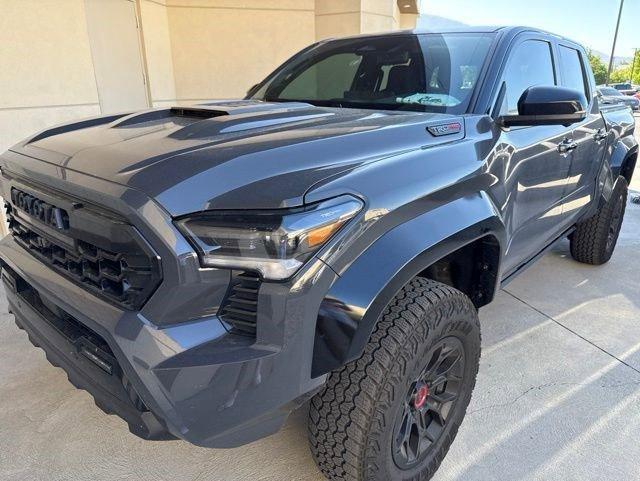 used 2025 Toyota Tacoma Hybrid car, priced at $63,399