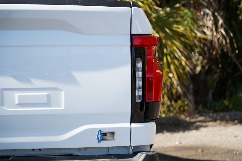used 2022 Ford F-150 Lightning car, priced at $32,200