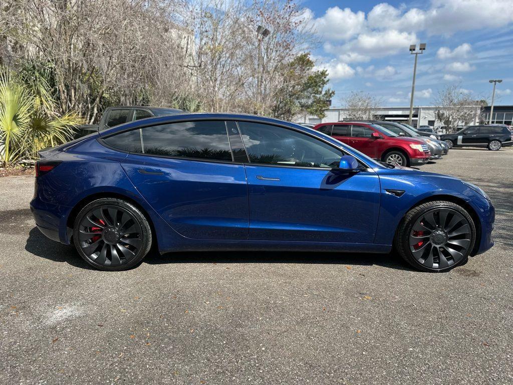 used 2022 Tesla Model 3 car, priced at $27,895