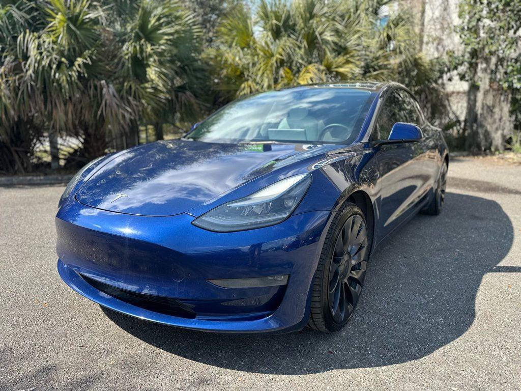 used 2022 Tesla Model 3 car, priced at $27,895