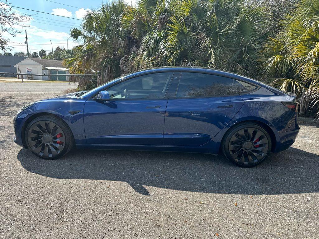 used 2022 Tesla Model 3 car, priced at $27,895