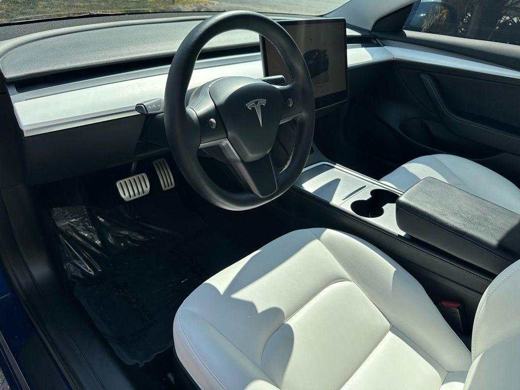 used 2022 Tesla Model 3 car, priced at $27,895