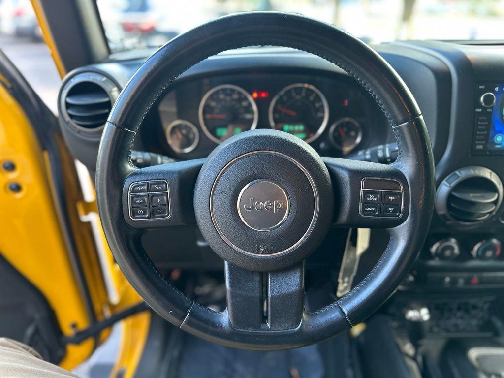 used 2015 Jeep Wrangler Unlimited car, priced at $15,895