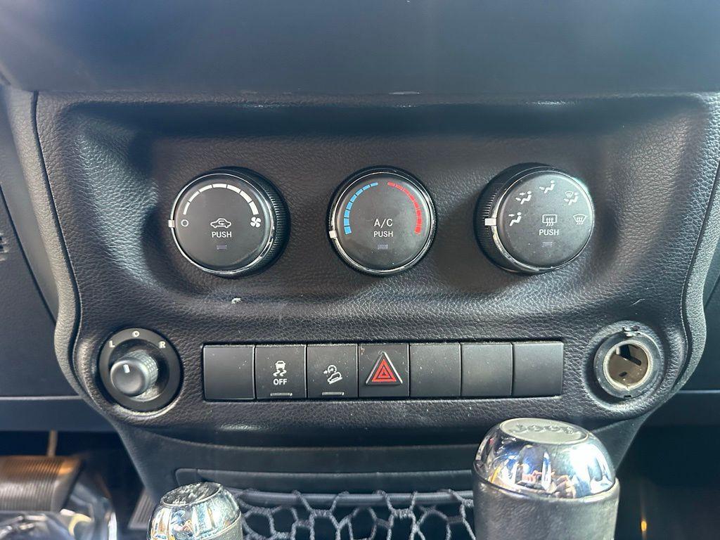 used 2015 Jeep Wrangler Unlimited car, priced at $15,895