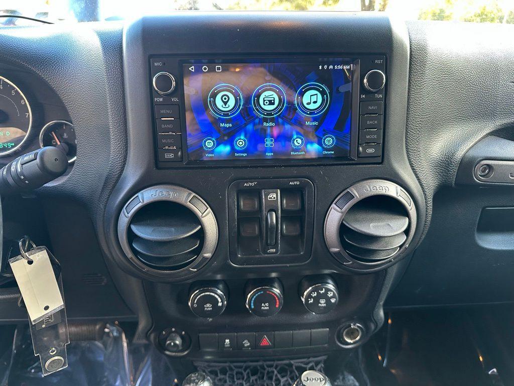 used 2015 Jeep Wrangler Unlimited car, priced at $15,895