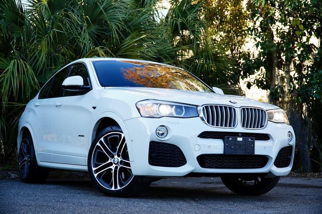 used 2018 BMW X4 car, priced at $17,495