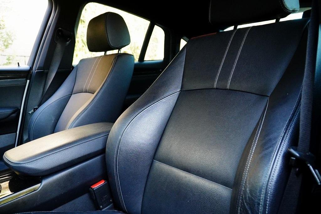 used 2018 BMW X4 car, priced at $17,495