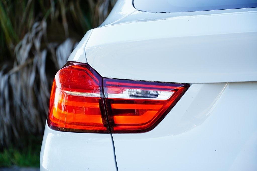 used 2018 BMW X4 car, priced at $17,495