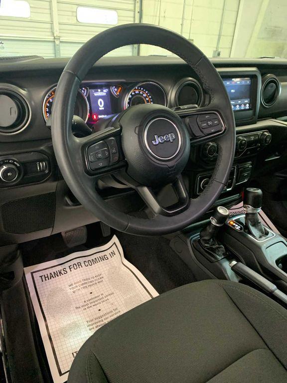 used 2023 Jeep Wrangler car, priced at $29,589