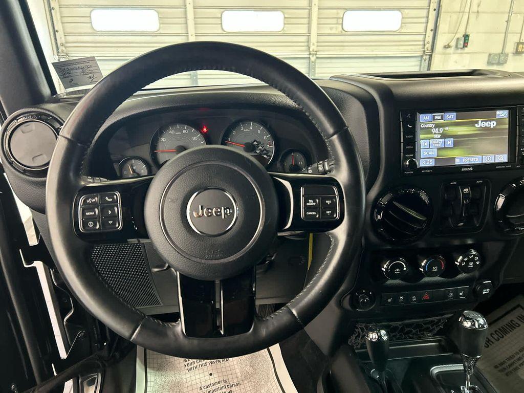 used 2017 Jeep Wrangler Unlimited car, priced at $27,686