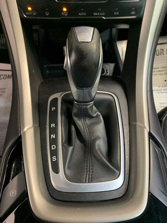 used 2014 Ford Fusion car, priced at $12,979