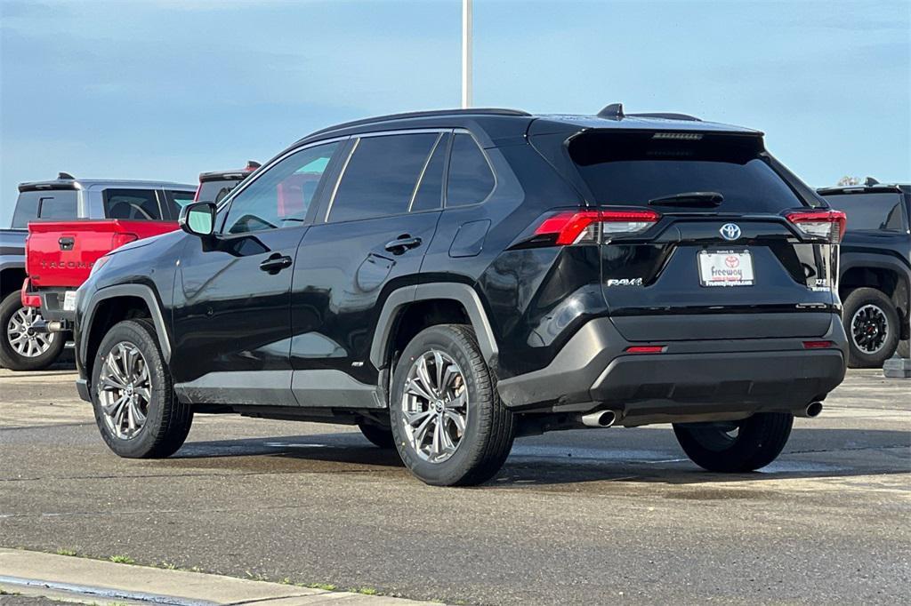 used 2022 Toyota RAV4 Hybrid car, priced at $27,990