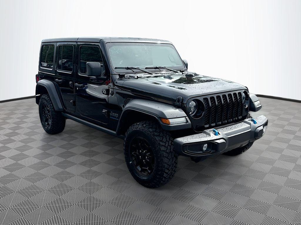 used 2023 Jeep Wrangler 4xe car, priced at $23,864