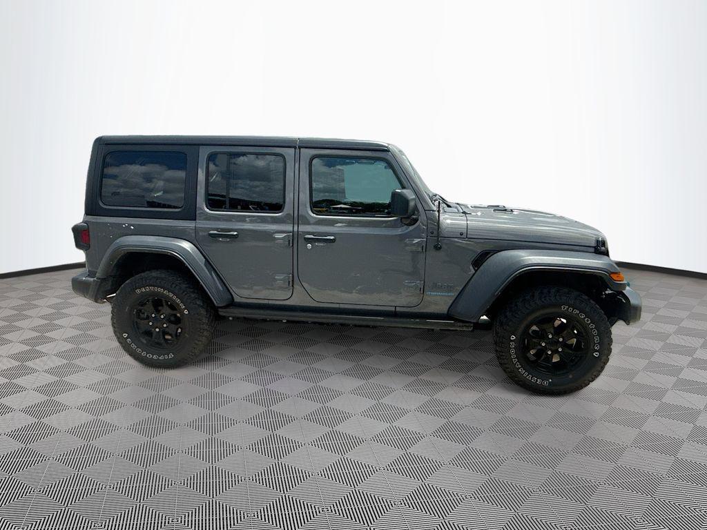 used 2023 Jeep Wrangler 4xe car, priced at $25,064