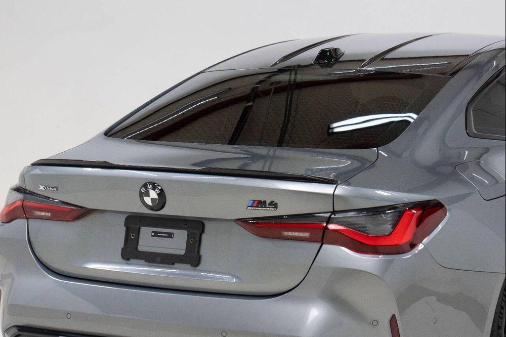 used 2024 BMW M4 car, priced at $84,999