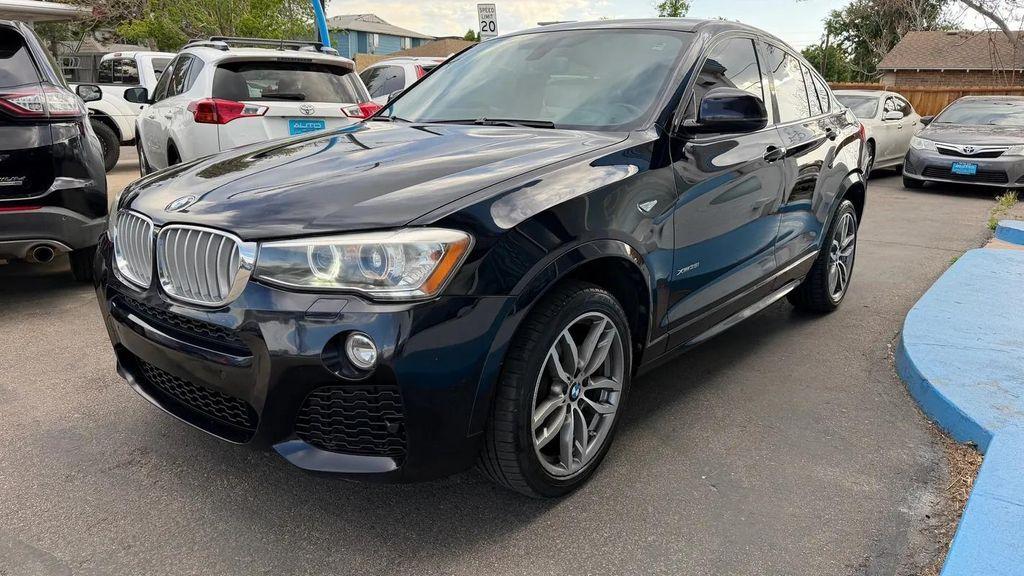used 2015 BMW X4 car, priced at $11,900