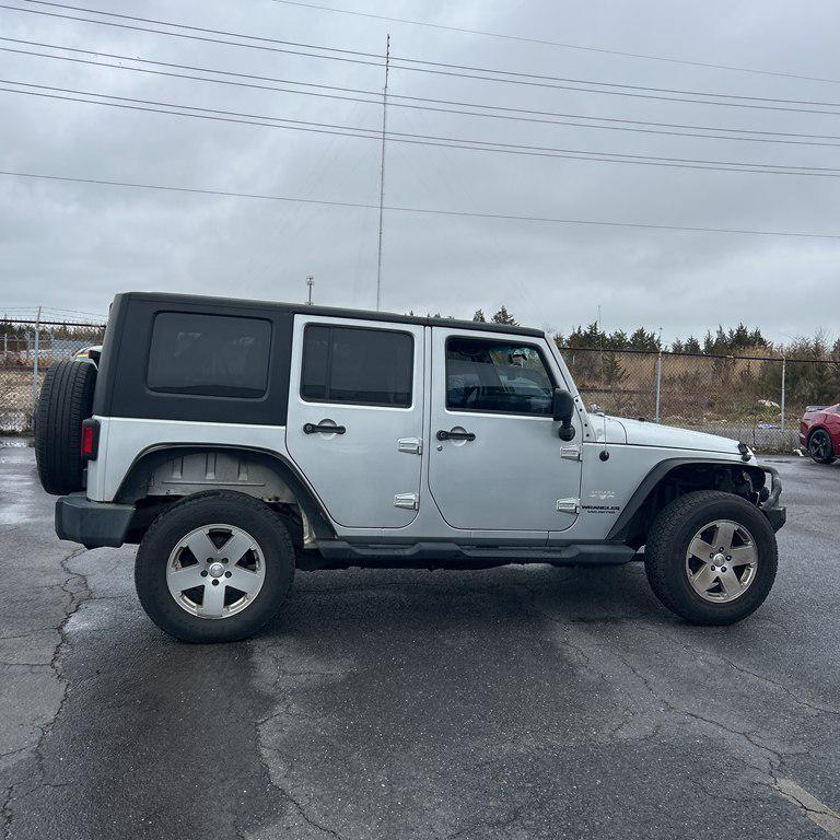 used 2010 Jeep Wrangler Unlimited car, priced at $11,995