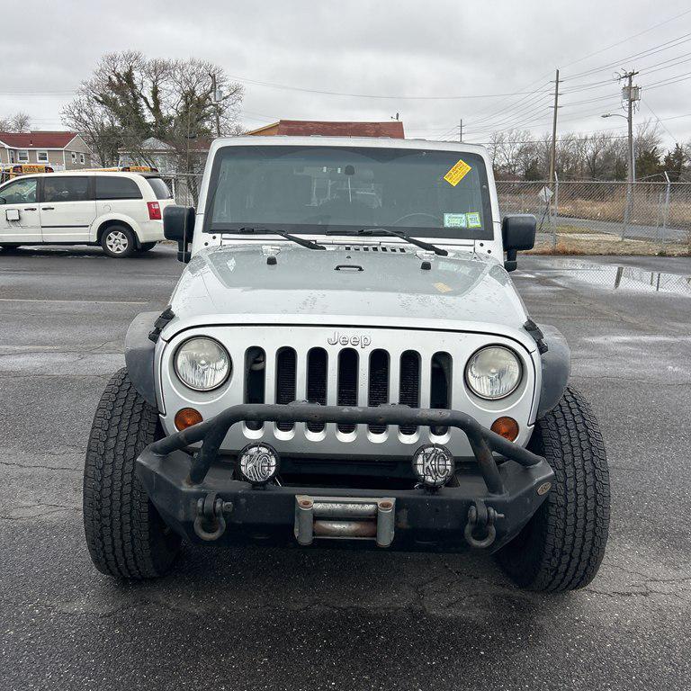 used 2010 Jeep Wrangler Unlimited car, priced at $11,995